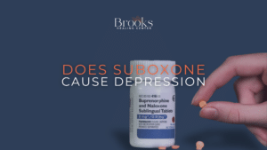 blog answering the question Can Suboxone Cause depression? and information on which depression or anxiety medications can be taken safely with suboxone, featured image shows a bottle of buprenorphine nalaxone sublingual tablets on it 2mg/.5mg